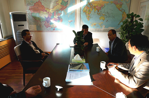 副校长张国珍拜访新疆校友